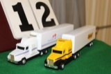 (2) 1/64 FREIGHTLINER SEMIS WITH TRAILERS,
