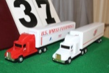 (2) 1/64 FREIGHTLINER SEMIS WITH TRAILERS,