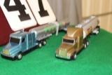 (2) 1/64 FREIGHTLINER SEMIS WITH TRAILERS,