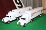 (2) 1/64 FREIGHTLINER SEMIS WITH TRAILERS,