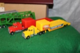 (4) HOT WHEELS HAULING SEMIS, (2) CABOVER