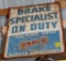 Ammco Brake Specialist On Duty single sided tin sign, 28