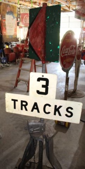 Railroad sign with 3 tracks