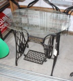 Singer treadle sewing machine stand with glass top, 25