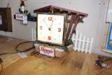 Hamm's Beer plastic revolving clock with river scene, revolver tests and wo