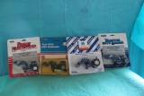 (4) 1/64 Ford (2) TW-35, 8730, and 7840 with loaders, in bubbles