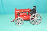 Cast iron tractor with man
