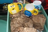 (2) Plastic totes of M & M mugs and candy dishes