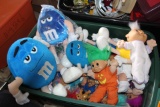 Plastic tote of stuffed M & M characters, trolls and other dolls