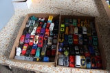 (2) flats Hot Wheels and Matchbox cars and t
