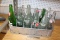 (18) Glass soda bottles in metal holder