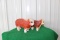 (2) red cow statues