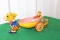 Metal toy Peter Rabbit with wagon, wind up duck