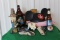 Mickey Mouse hat, Hamm's bottles, toy pistols, fishing dwarf statue