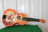 Roy Rogers ukelele, warped and damaged