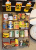 Alemite display rack with various oil and automotive cans