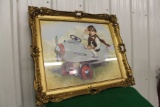 Child in toy plane picture in frame