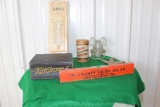 F&M Agency thermometer, AA tin plane, Autdel's Auto Guide, Tri-county Co-op