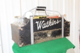 Wood Watkins holder with glass bottles and metal cans