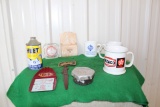 Gasoline brand mugs, empty DeMert HEET anti-freeze can, ashtrays, letter op