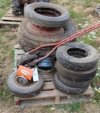Assortment of tires and rims, David Bradley tiller attachment