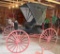 Single horse buggy with canopy, wood spoke wheels, stored inside, pole included