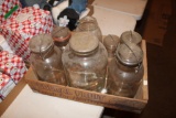 Antique glass jars, some with glass lids