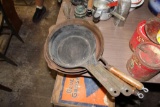 Cast iron and metal frying pans