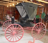 Single horse buggy with canopy, wood spoke wheels, stored inside, pole included