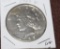 1923 D PEACE SILVER DOLLAR, ALMOST UNCIRCULATED