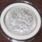 1878 MORGAN SILVER DOLLAR, ALMOST UNCIRCULATED