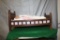 ANTIQUE DOLL BED, BLANKETS, AND DOLL WITH CLOTHES - DATED ON BOTTOM