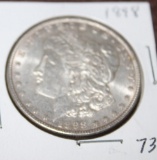 1898 MORGAN SILVER DOLLAR, ALMOST UNCIRCULATED