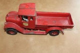 CAST IRON INTERNATIONAL TRUCK, TOP OF CAB IS BROKE OUT BUT PART IS INCLUDED, PAINT CHIPS,