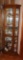 CORNER GLASS CURIO CABINET (DOES NOT INCLUDE ITEMS IN CABINET), APPROX. 29