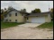 2+ Bedroom Home with Attached Garage and Storage Buildings on 2.5 acres +/- with Tar Road Access.