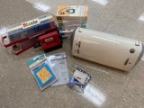 Used Cricut CRV001 personal electronic cutter with 1 font cartridge and 4 shape cartridges. Also