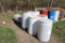 (6) Poly 55 Gallon Barrels, (1) Steel 55 Gallon Barrel