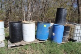 (7) Poly 55 Gallon Barrels, (1) Steel 55 Gallon Barrel