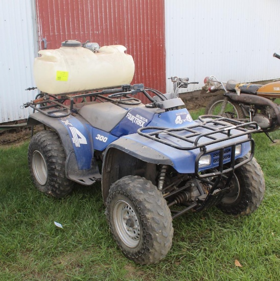 HONDA FOURTRAX 300 ATV, HAS NOT HAD RUNNING IN OVER A YEAR, SPRAYER SOLD IN LOT 52