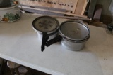 PRESSURE COOKERS