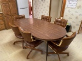 DINING ROOM TABLE WITH ONE LEAF AND (6) ROLLING CHAIRS