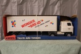 WONDER BREAD SEMI TRACTOR AND TRAILER, TOY NEEDS CLEANING, BOX HAS LIGHT DAMAGE