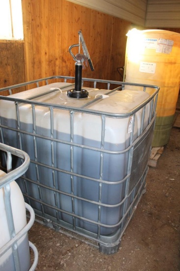 POLY CAGE TOTE, OWNER STATES IT'S 5W30 OIL, APPROX. 250 GAL., HAND PUMP