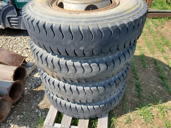 Qty. Of 4 10.00 X 20 Tires On Hub Pilot Split Rim Wheels