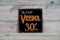 The New Veedol 30¢ Single Sided Tin Embossed Metal Sign TAC 7.75