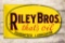 Riley Brothers Bros. That's Oil Guaranteed Lubrication Porcelain Flange Sign