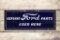 Genuine Ford Parts Used Here Porcelain Sign
