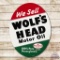 1964 We Sell Wolf's Head Motor Oil Double Sided Tin Sign