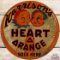 Harrison's Heart O' Orange Sold Here Emb. SS Tin Sign w/ Bottle